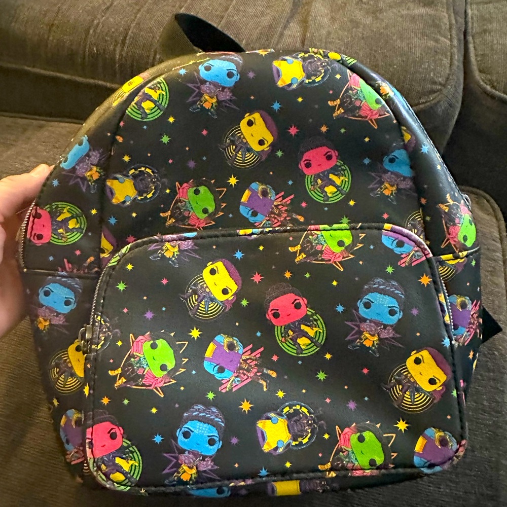 Vinyl Pop backpack. Black vinyl avengers neon marvel characters.